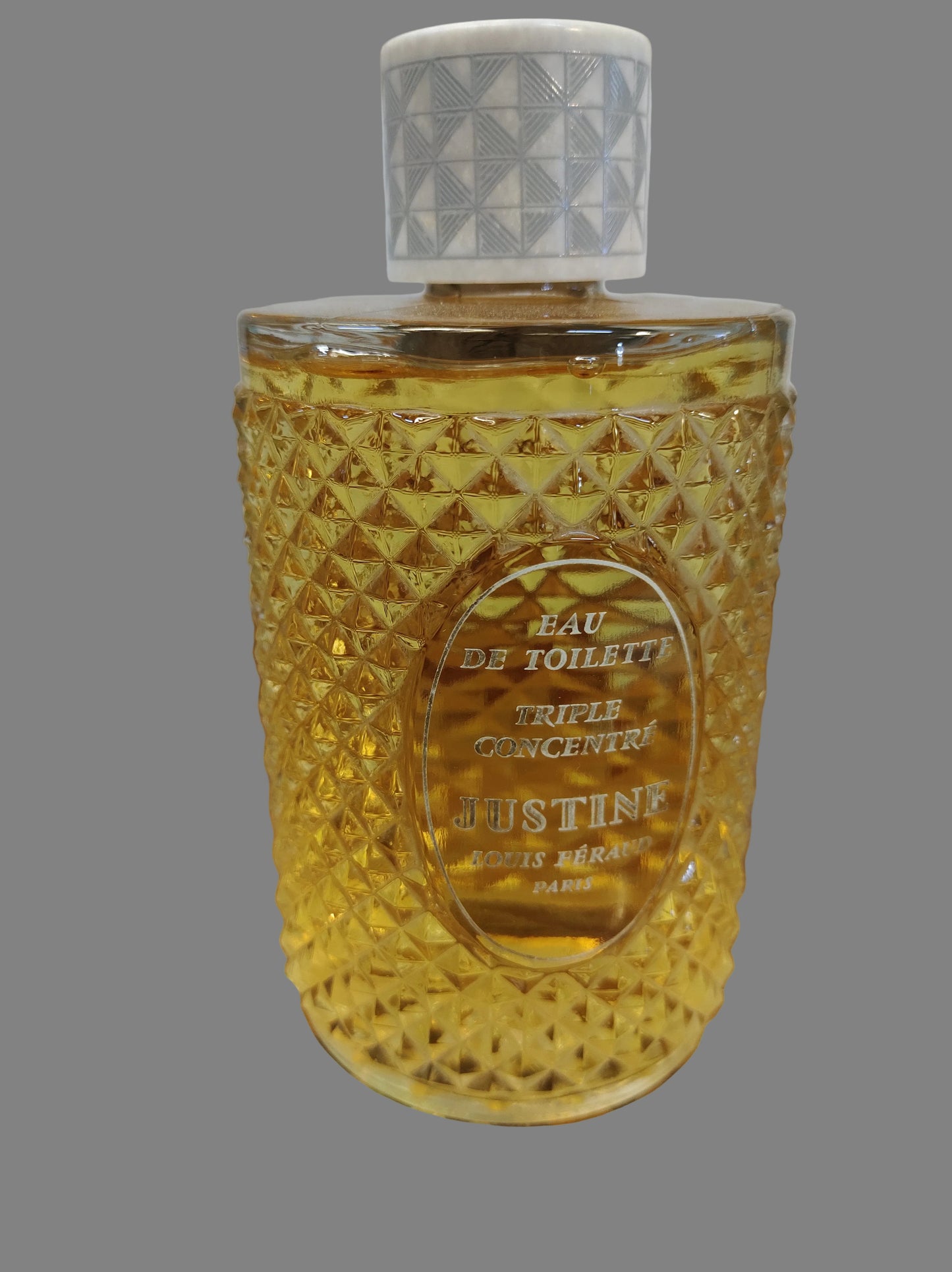 Eau de cologne triple concentré JUSTINE. Louis Féraud Paris.
